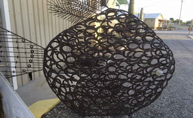 Fish sculpture welded from old horseshoes in the Mechanical Zoo