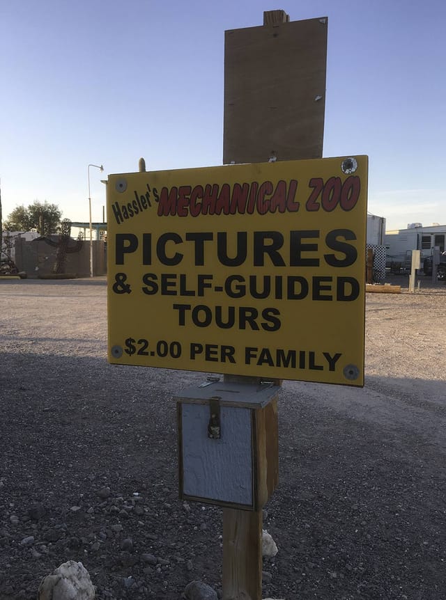 Hassler's Mechanical Zoo sign advertising pictures and self-guided tours