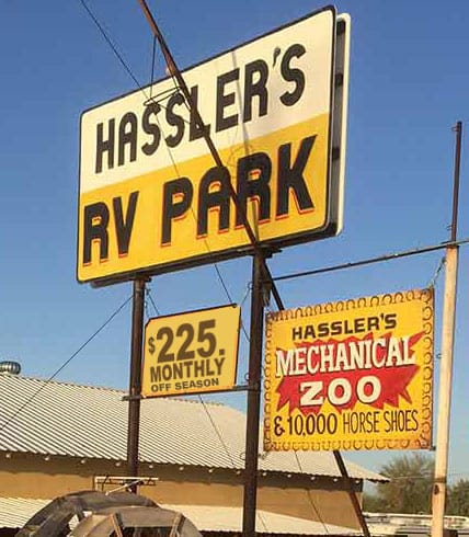 Hassler's RV Park and Mechanical Zoo roadside signs